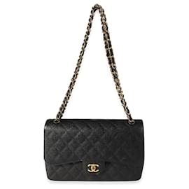 Chanel-Bolsa Chanel Black acolchoada Caviar Jumbo Classic forrada com aba-Preto