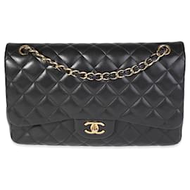 Chanel-Bolsa Chanel Black acolchoada em pele de cordeiro Jumbo Classic forrada com aba-Preto