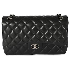 Chanel schwarz gesteppte Lammfell Jumbo Classic gefütterte Klappe Schwarz