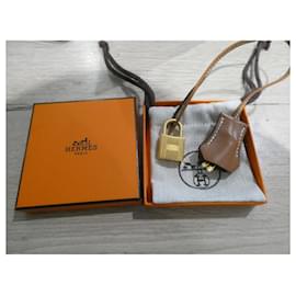 Hermès-clochette , Nueva cremallera Hermès y candado para bolsa guardapolvo Hermès-Gold hardware