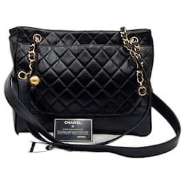 Chanel-Bolsa de ombro e sacola Chanel Grand Shopping com detalhes dourados-Preto