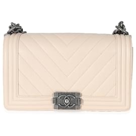 Chanel-Sac garçon moyen en cuir caviar matelassé à chevrons beige clair Chanel-Beige