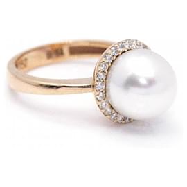 Autre Marque-Pearl and Diamond Ring.-Golden