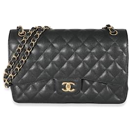 Chanel-Bolso con solapa con forro jumbo de caviar acolchado negro de Chanel-Negro