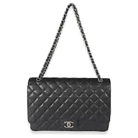 Chanel-Chanel Bolsa com aba preta acolchoada Caviar Maxi forrada-Preto