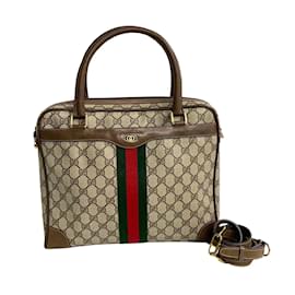 Gucci-GG Supreme Handbag 378 002-Brown