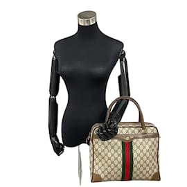 Gucci-GG Supreme Handbag 378 002-Brown