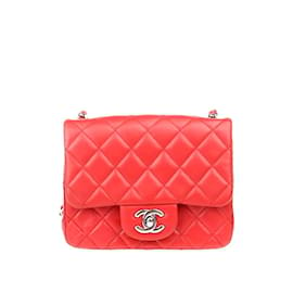 Chanel-Bolsa com aba mini clássica de couro acolchoado-Laranja