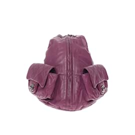 Chanel-La mochila de piel de cordero es una bolsa trasera-Púrpura