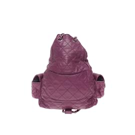 Chanel-La mochila de piel de cordero es una bolsa trasera-Púrpura