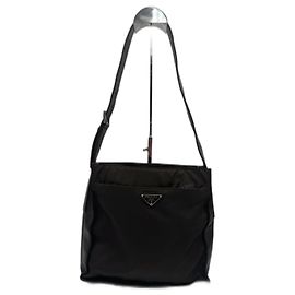 Prada Bolsa Tessuto em nylon e couro Castanho escuro