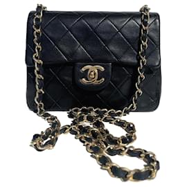 Chanel-Bolso de mano Chanel Mini Timeless en cuero acolchado negro-Negro