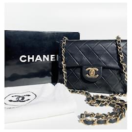 Chanel-Bolso de mano Chanel Mini Timeless en cuero acolchado negro-Negro
