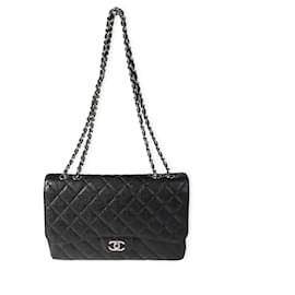 Chanel-Bolsa Chanel Black Caviar acolchoada Jumbo Classic com aba simples-Preto