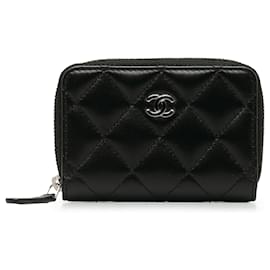 Chanel-Bolsa para moedas Chanel preta acolchoada em couro de pele de cordeiro-Preto