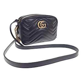 Gucci-Bolsa tiracolo mini GG Marmont 448065-Outro