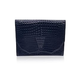 Yves Saint Laurent-Bolsa clutch com aba em relevo de couro preto vintage-Preto