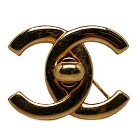 Chanel-Goldene Chanel CC Drehverschluss-Brosche-Golden