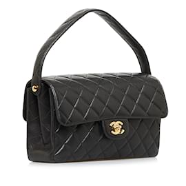 Chanel-Schwarze Chanel Classic-Handtasche mit Lammlederfutter und seitlicher Klappe-Schwarz