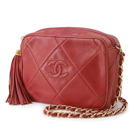 Chanel-Bolsa crossbody Chanel CC vermelha em couro de cordeiro com borla-Vermelho