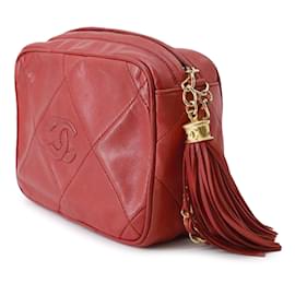 Chanel-Bolsa crossbody Chanel CC vermelha em couro de cordeiro com borla-Vermelho