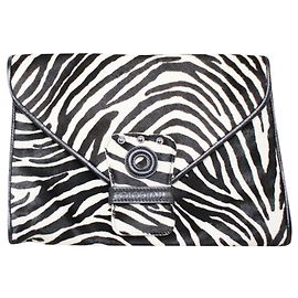 Kate Moss Clutch para Longchamp Outro