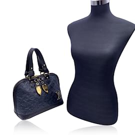 Louis Vuitton-Blaue Neo Alma gefütterte Jeu-Tasche aus Leder mit Monogramm-Blau