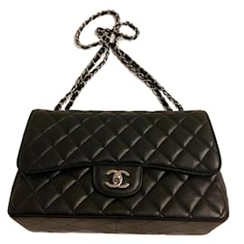 Chanel-Maxi caviar black leather Chanel timeless-Noir