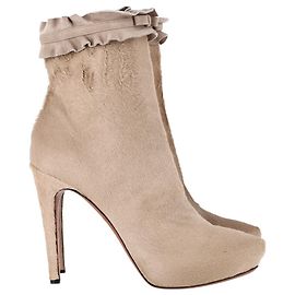 Alaïa Ruffle enfeitado com botins em arco em cabelo de cavalo nude Marrom Carne