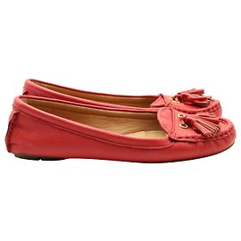 Coach Mocassins à pompons en Cuir Rouge Rouge