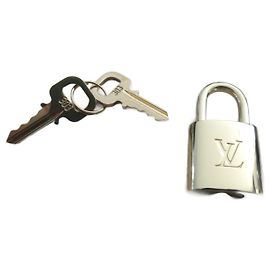 cadenas louis vuitton pour sac a main ou sac de voyage état neuf Bijouterie dorée