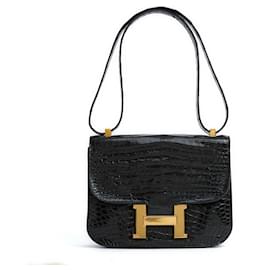 Hermès-Bolsa de couro preto precioso Hermes Sac Constance.-Preto