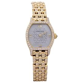 Cartier-Reloj Cartier “Tortoise” de oro amarillo, diamantes, Madre perla.-Otro