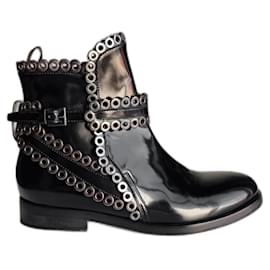 Alaïa-Alaia black leather flat boots with metal circles-Black