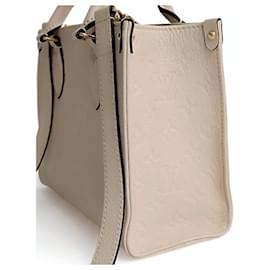 Louis Vuitton-Louis Vuitton OnTheGo Empreinte PM shoulder bag in ivory leather-White,Beige