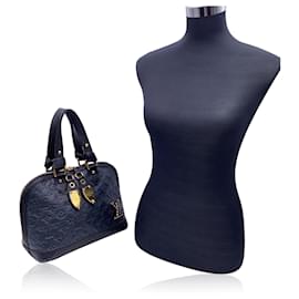 Louis Vuitton-Blaue Neo Alma gefütterte Jeu-Tasche aus Leder mit Monogramm-Blau