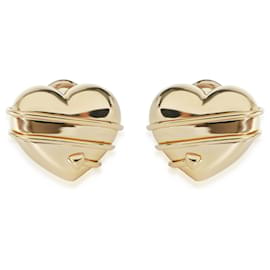 Tiffany & Co-TIFFANY & CO. Orecchini vintage a forma di cuore avvolto con una freccia 18K oro giallo-Argento,Metallico