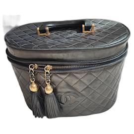 Chanel-Large black leather Chanel vanity case. Used, good condition. Spacious. Condition 5/10.-Black