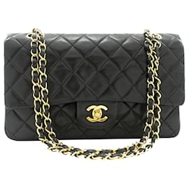 Chanel-Schwarze Farbe 1989-1991 Mittelgroße klassische gefütterte Überschlagtasche-Schwarz
