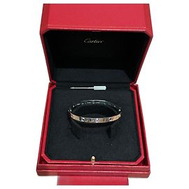 Bracelet Love de Cartier avec 10 saphirs. Gris