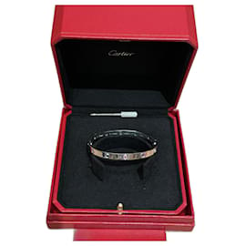 Cartier-Bracelet Love de Cartier avec 10 saphirs.-Gris