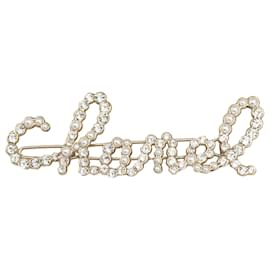 Chanel-Pasador con logo giratorio de perlas y diamantes de imitación dorados de Chanel-Dorado