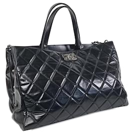 Chanel-Bolso satchel CC de piel de becerro acolchado Chanel negro-Negro