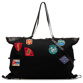 Saint Laurent-Schwarze Saint Laurent Canvas-Reisetasche mit ID-Patches und umwandelbarem Logo -Schwarz