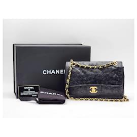 Chanel-Bolso con solapa de avestruz clásico Timeless de Chanel-Negro