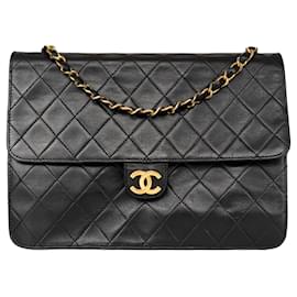 Chanel-Pelle di agnello trapuntata Chanel 24Borsa senza tempo con patta singola K Gold-Nero