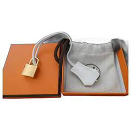 Hermès-campanilla, tirador y candado Hermès nuevos para bolso Hermès, caja y bolsa de polvo.-Blanco