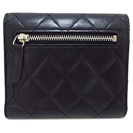 Chanel-Cartera Chanel CC de piel de cordero con solapa triple negra-Negro