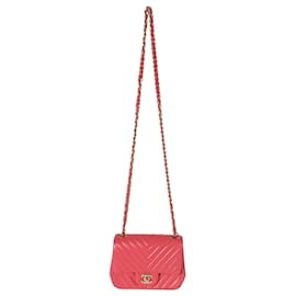 Chanel-Mini borsa con patta in pelle di agnello rosa Chanel Chevron-Rosa