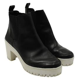 Autre Marque-Zeitgenössische Designer-Stiefel aus schwarzem Leder mit weißem Plateauabsatz-Schwarz